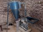 This is a grinder used for turning maize kernels into flour