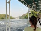 A tourist boat leading to Murchison waterfall