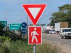 Some signs might look familiar. Crossing the road can be tricky when there are lots of cars and trucks
