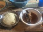 Fufu with pima sauce and a goat head