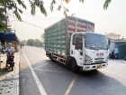 A small cargo truck used to deliver goods from suppliers to stores and businesses
