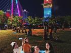 I video call an elementary classroom in Texas from Saigon while waiting for Reunification Day fireworks.