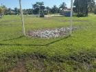 A football field at a local park after a storm, it is muddy! 