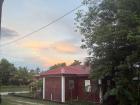 A sunset in Belize along an alley