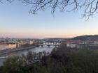 A sunset over the main river running through Prague