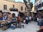 A busy part in the center of the medina with many places to shop and explore