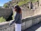 Kalina standing on the Roman Bridge in Toledo, Spain