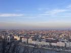 The view of the sunset across the city from Gellert hill during a hike.