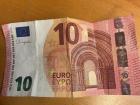 This is a 10 euro bill. The money here comes in bright colors like blue, green, and orange!