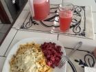 Cheesy noodles with a beet salad that consists of beets, eggs, potatoes, and mayo
