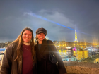 This is a photo of me and my friend Hannah with the Eiffel Tower glittering in the background!