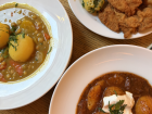 Goulash (a potato and tomato soup) along with schnitzel (breaded meat) in Vienna, Austria (Austria is another European country)