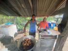 My host dad and uncle cooking up BBQ chicken for the party