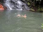 Another volunteer and I swimming at the bottom of a waterfall after a hike