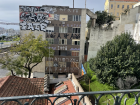 Graffitied building in Lisbon.