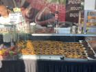 A local pop-up food stand offering traditional Portuguese pastries and fresh prepared snacks.