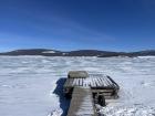 Looking over a snow-covered Lake Khuvsgul from the shore
