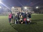 Volunteers and counterparts after an intense football match