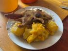 Cuy with rice and potatoes