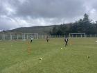 Playing soccer at the local stadium