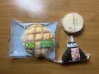 Breakfast - consisting of melon bread, and egg and salmon "onigiri", or rice balls