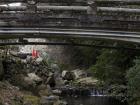 A bridge going over a river at Minoh