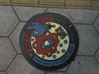 Cool Japanese manhole cover design in Dotonbori, Osaka
