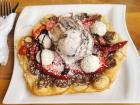 A cookies and cream flavored ice cream served on top of a bubble waffles from Inna's Bakery