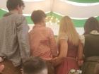 Here is some people standing on tables at the Fest