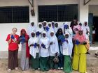 A group of students and I at the school after the reusable menstral pad workshop