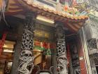 A photo of a temple tucked away into a street