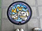 This manhole cover features Fidough. How cute!