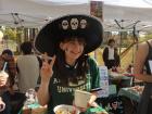 Me at the AIU festival, volunteering for a local bakery!