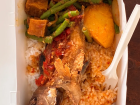 Whole fried fish, coconut rice, and sides at Pondok Nasi Lemak