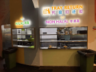 Tray return signs in English and Chinese, with separate windows for halal and non-halal dishes