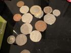 A collection of British coins that my roommate has acquired