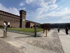 Sforza Castle’s main courtyard is surrounded by red-brick walls and imposing towers