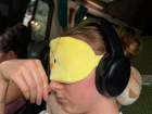 Me on the bus trying to sleep after feeling sick