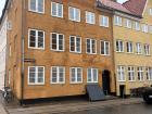 The buildings in my neighborhood in Copenhagen. You will find lots of buildings with this particular orange exterior throughout the city