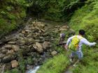 The Greenhood team hikes through a canyon to areas where they can deploy camera traps
