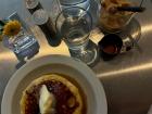 Breakfast in Porto: blueberry pancakes with corn syrup and butter