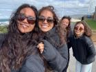 My friends and I struggling to take a photo with the strong winds blowing through our hair in Galicia