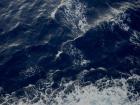 The wake of the ship going 30 thousand feet deep