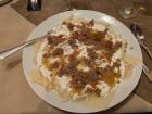 Khingal--a delicious Azerbaijani dish of caramelized onions, minced lamb, yogurt, and noodles