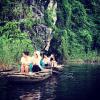 My friend and I are on a boat in Ninh Binh