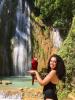 I am in a "salto" (Dominican for waterfall) in Samaná holding a macaw, historically found in the Caribbean.